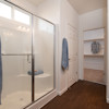 olivewood, cobalt primary suite bath, shower and wardrobe, fresno, ca