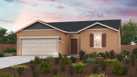 A house with a garage and a driveway.