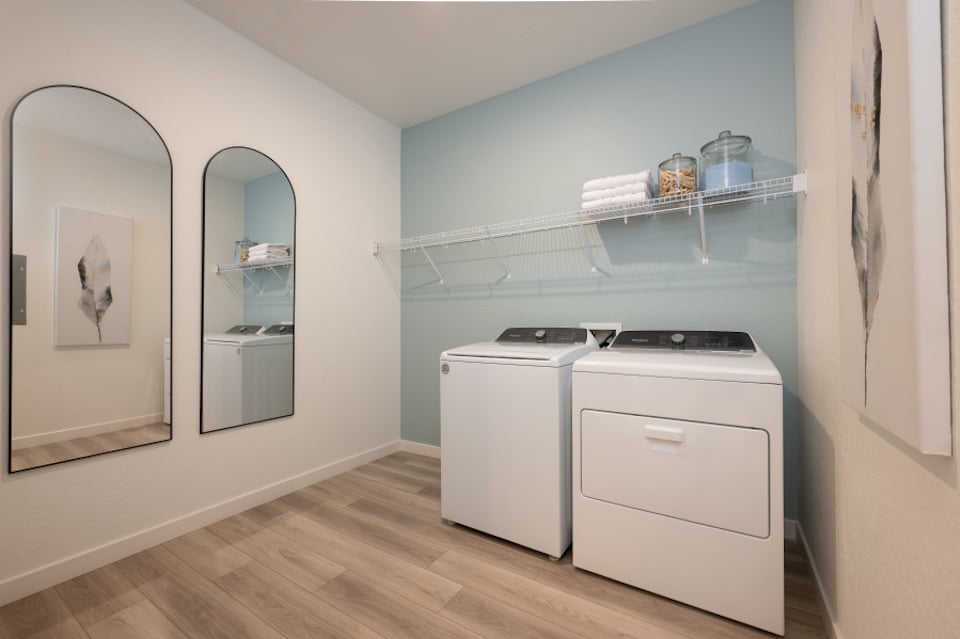 A kitchen with a white cabinet.