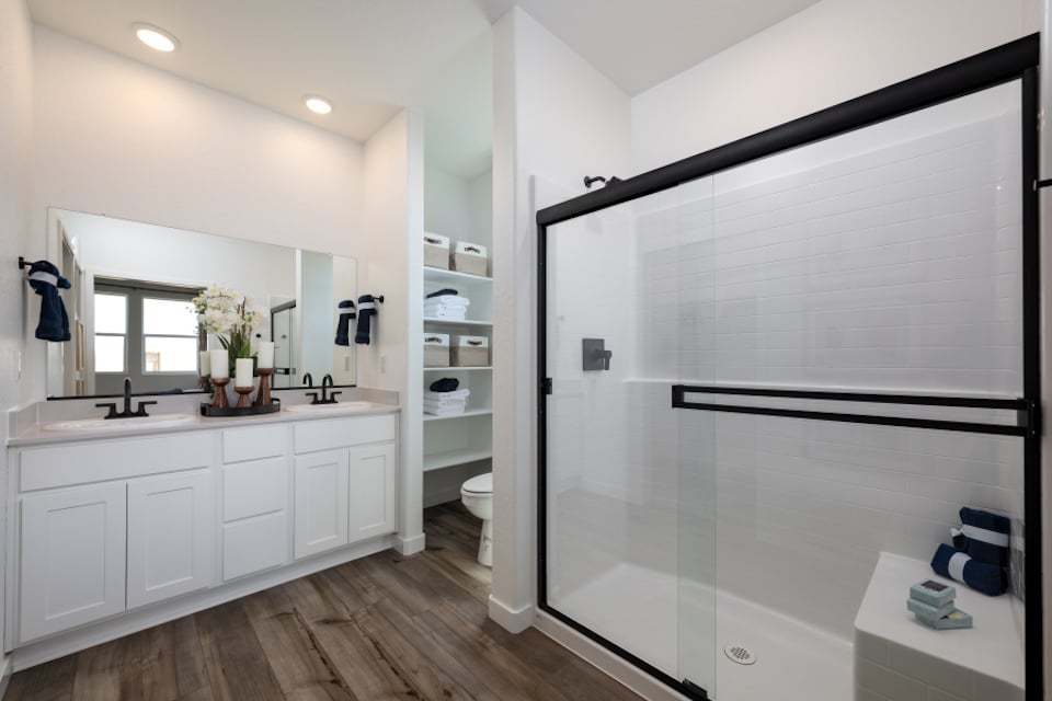 A bathroom with a glass shower.