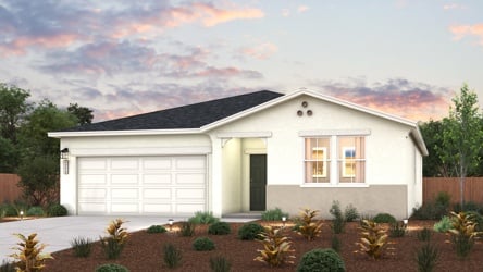 A house with a large front yard.