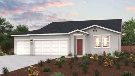 A house with a large front yard.