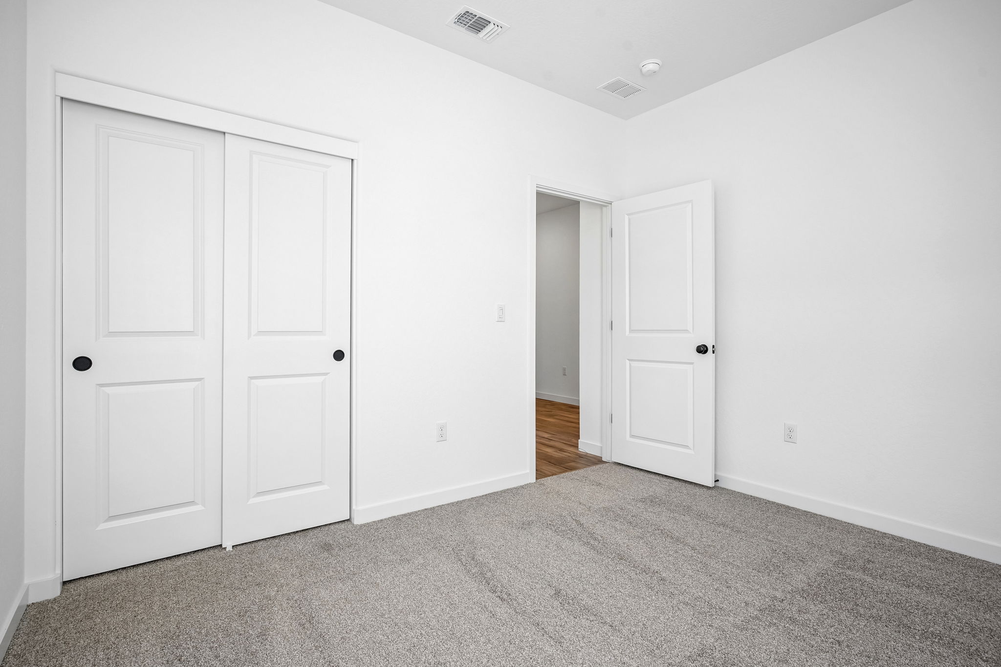 A room with white doors.