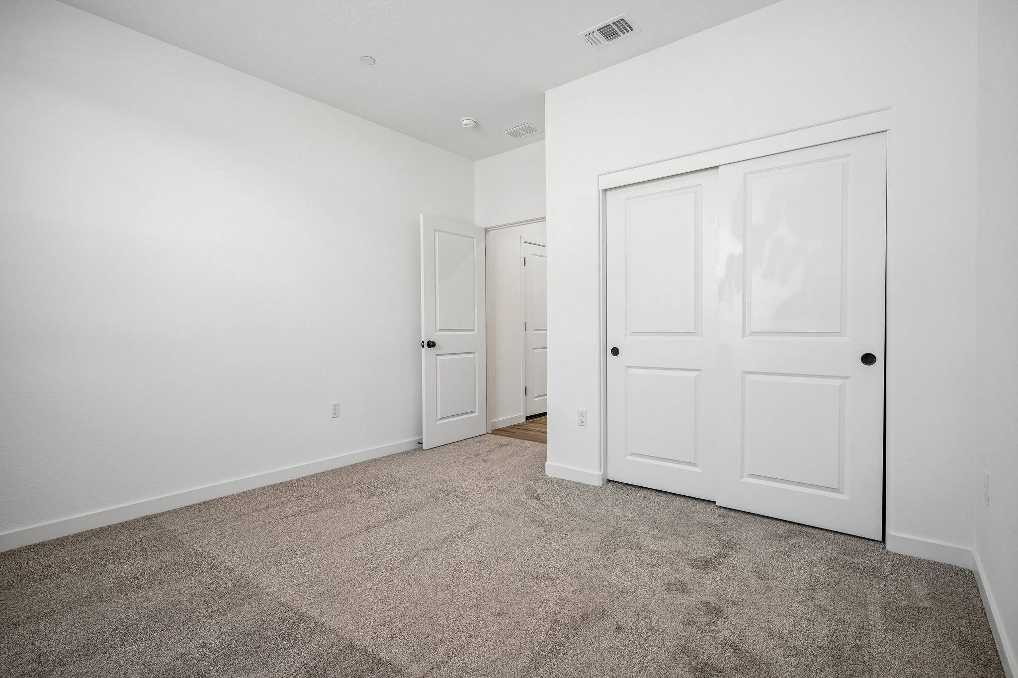 A room with white doors.
