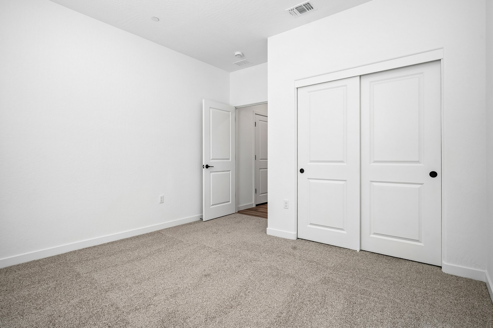 A room with white doors.