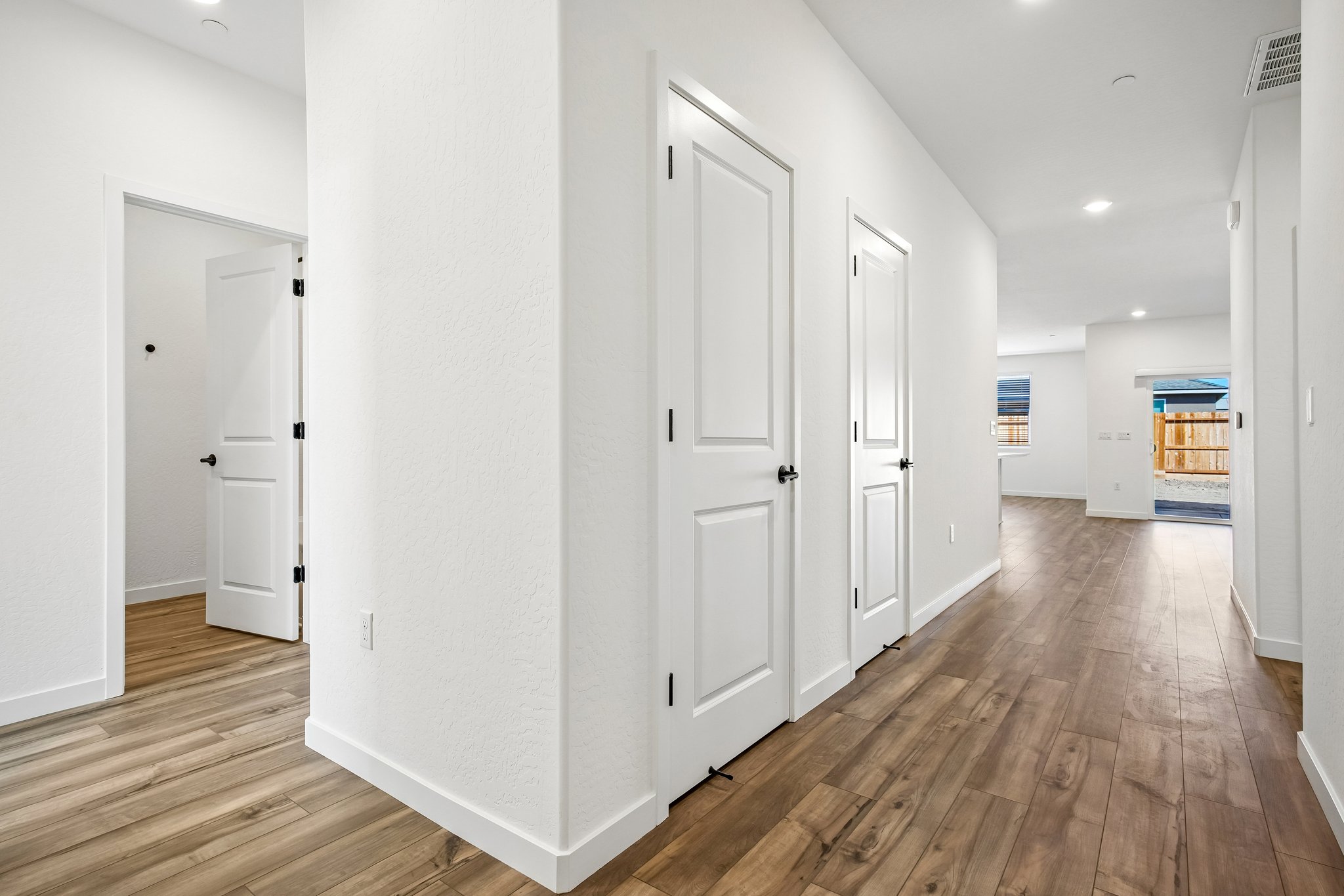 A room with white doors.