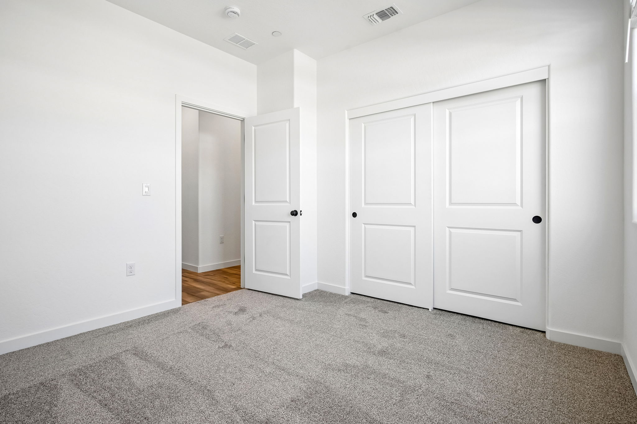 A room with white doors.