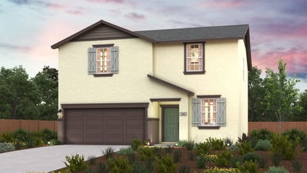 A house with a garage and a fence around it.