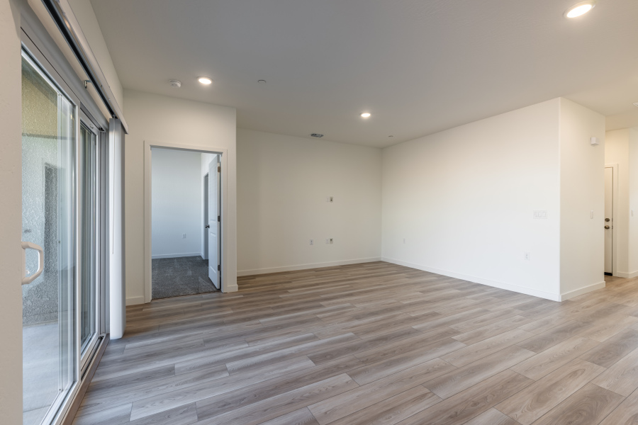 A room with a wood floor and a wood floor.