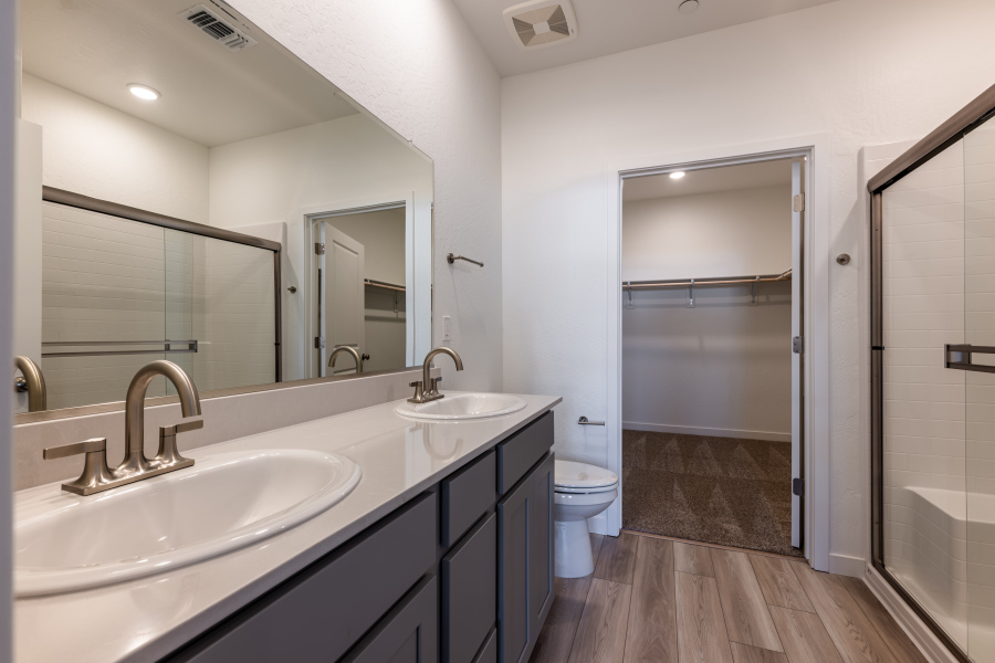 A bathroom with a glass shower.