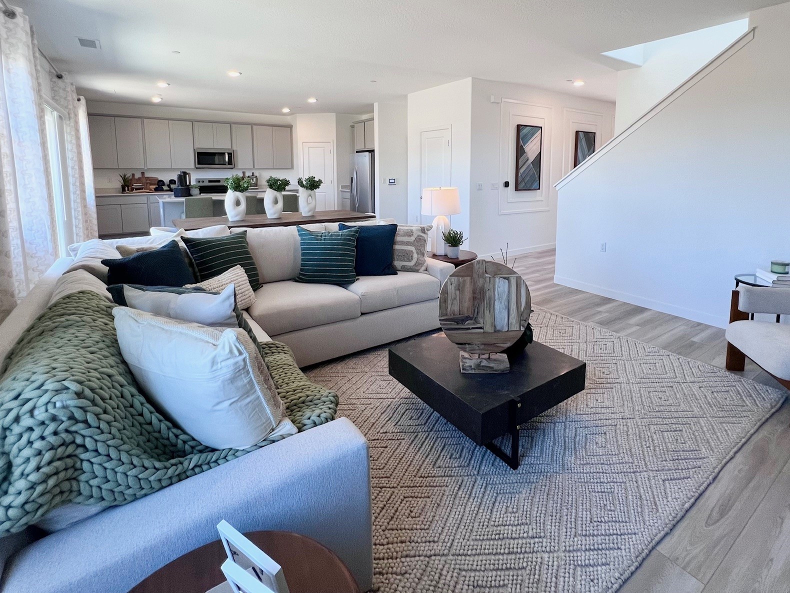A living room with a couch and a coffee table.