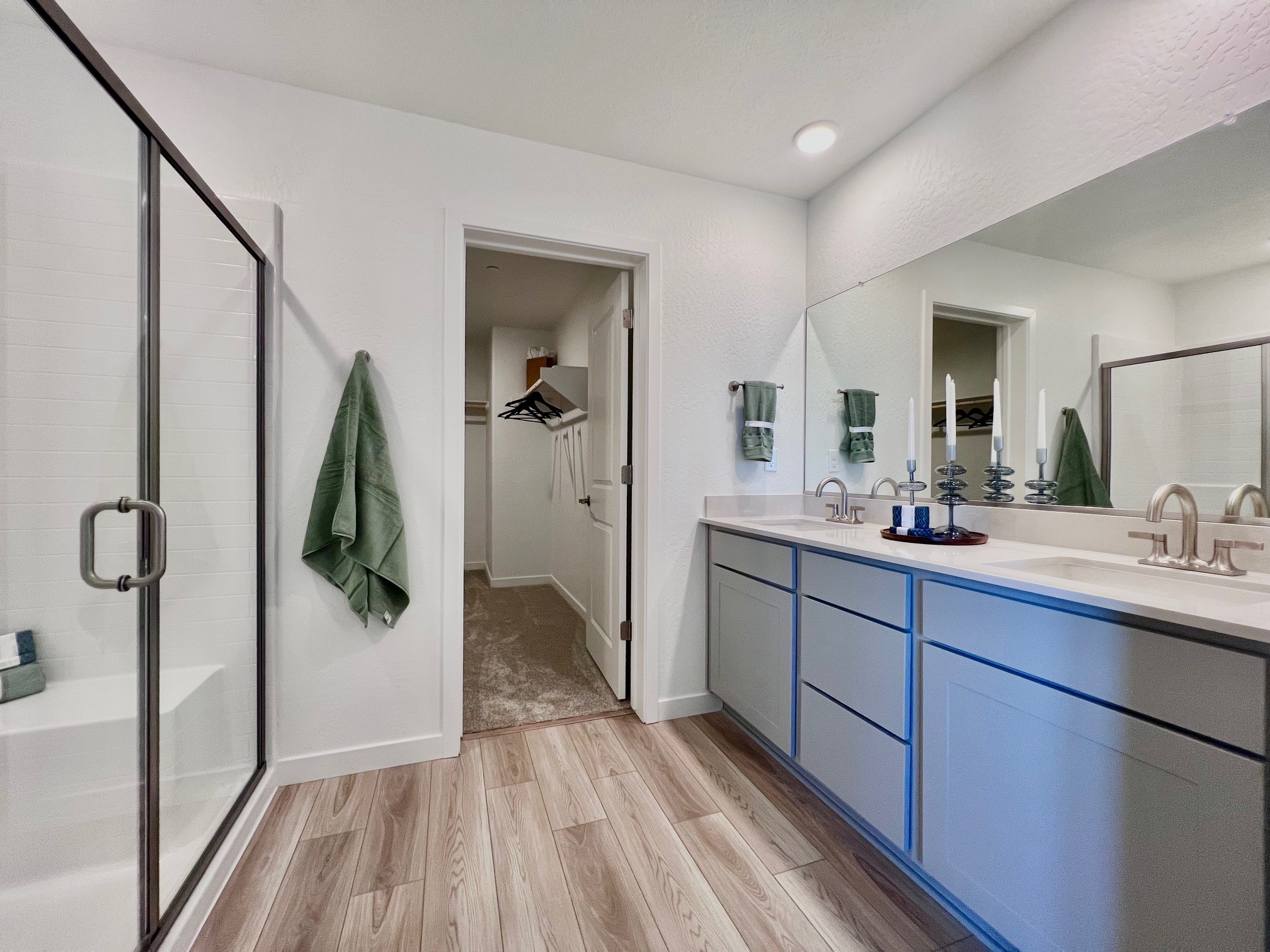 A bathroom with a glass shower.