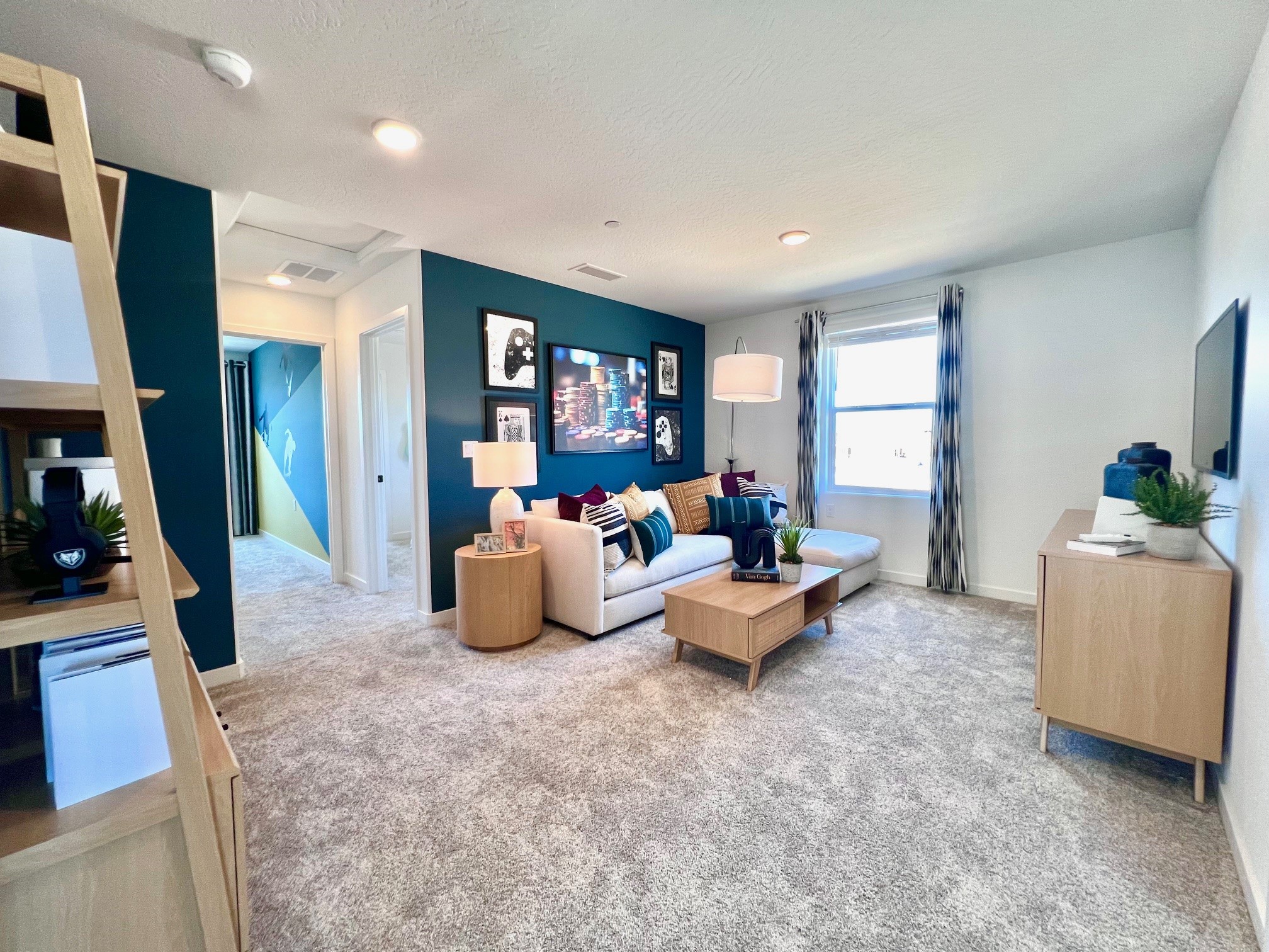 A living room with a couch and a table.
