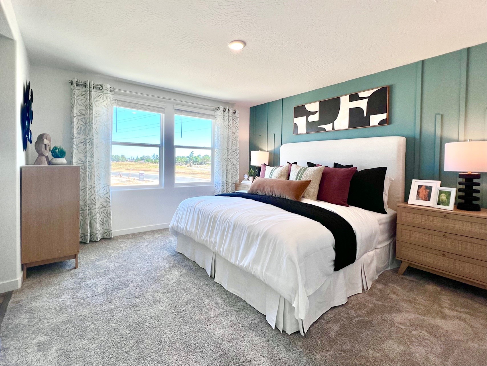 A bedroom with a large bed.