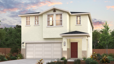 A white house with a garage.