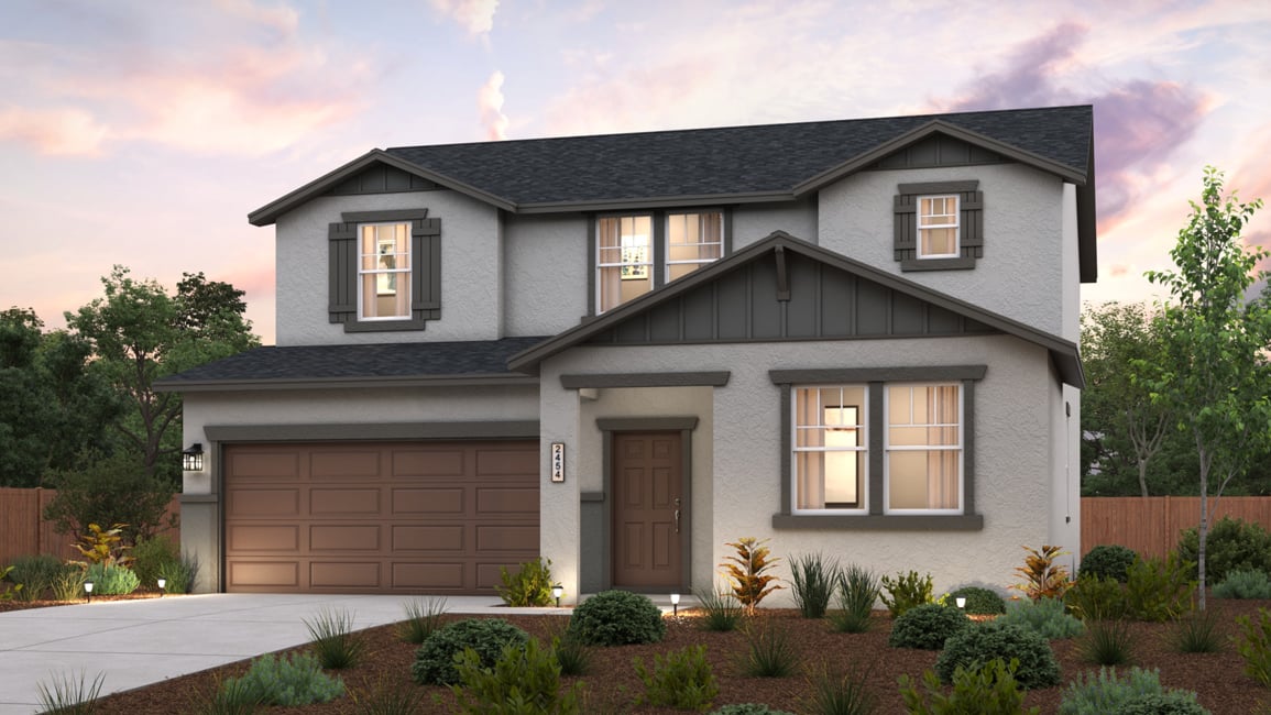 A house with a large front yard.