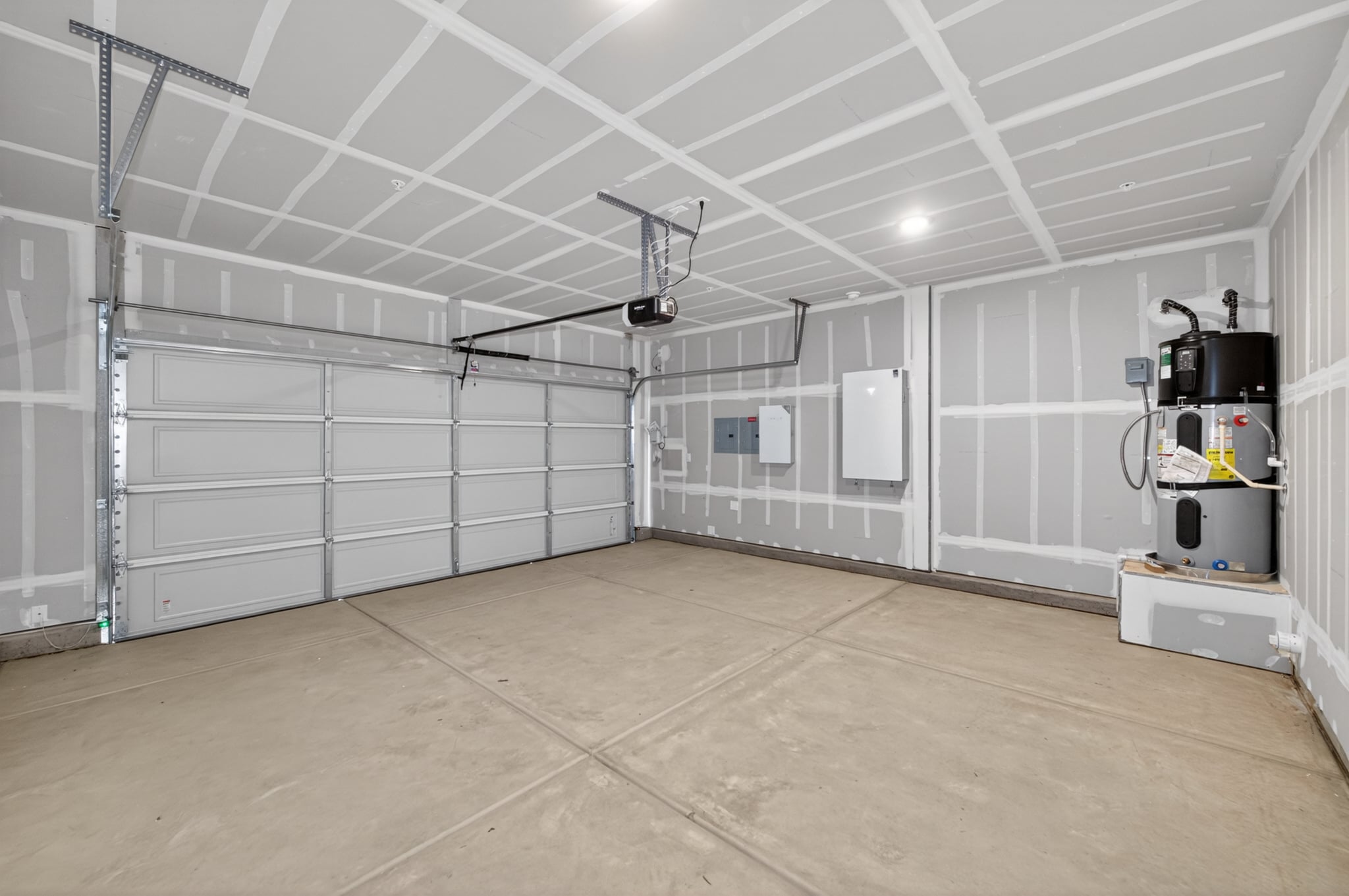 A room with white walls and a wood floor.