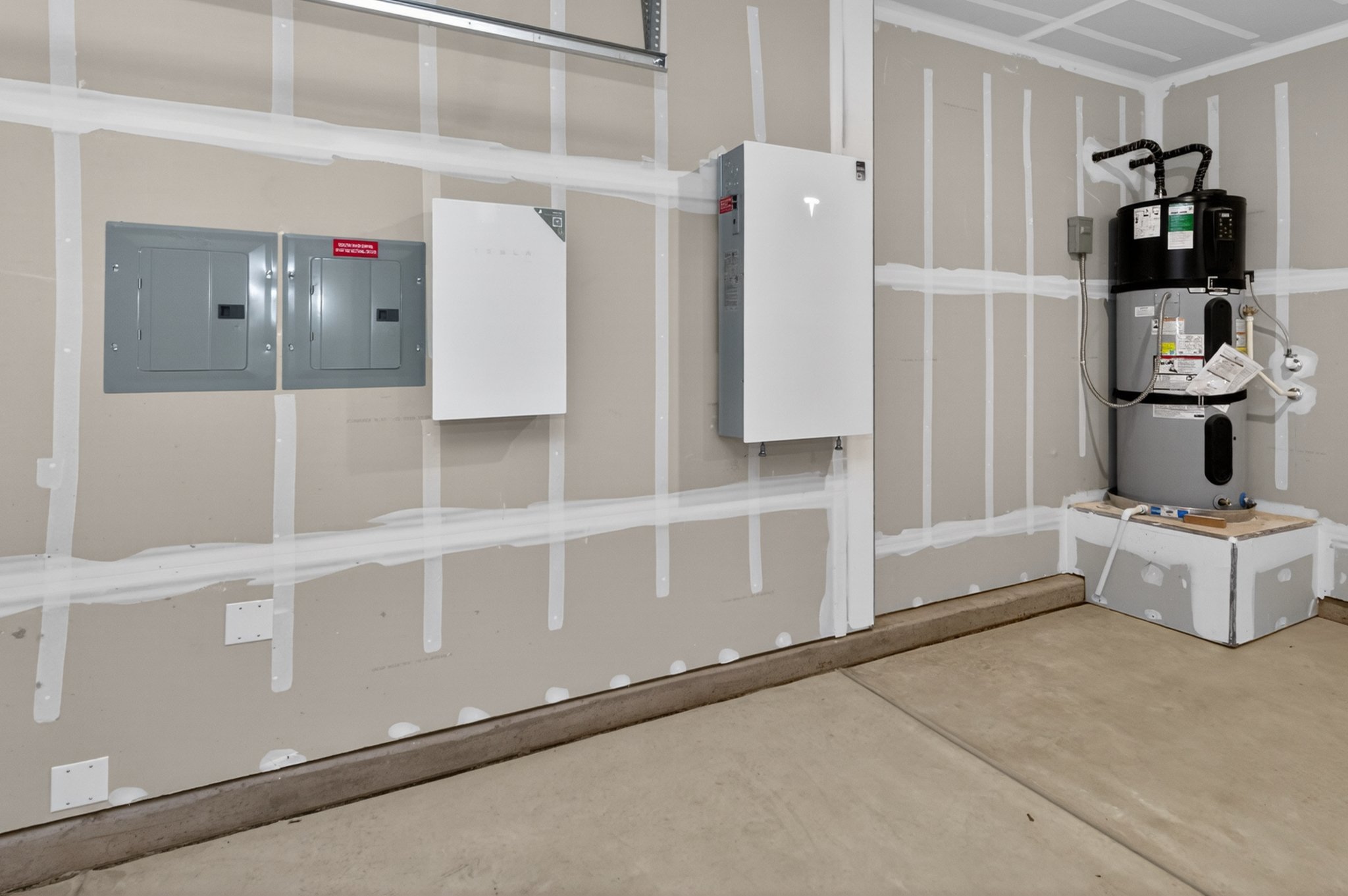 A room with white walls and a white counter with a machine on it.