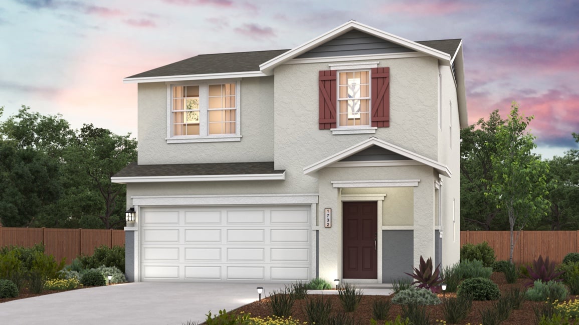 A house with a garage and a fence.