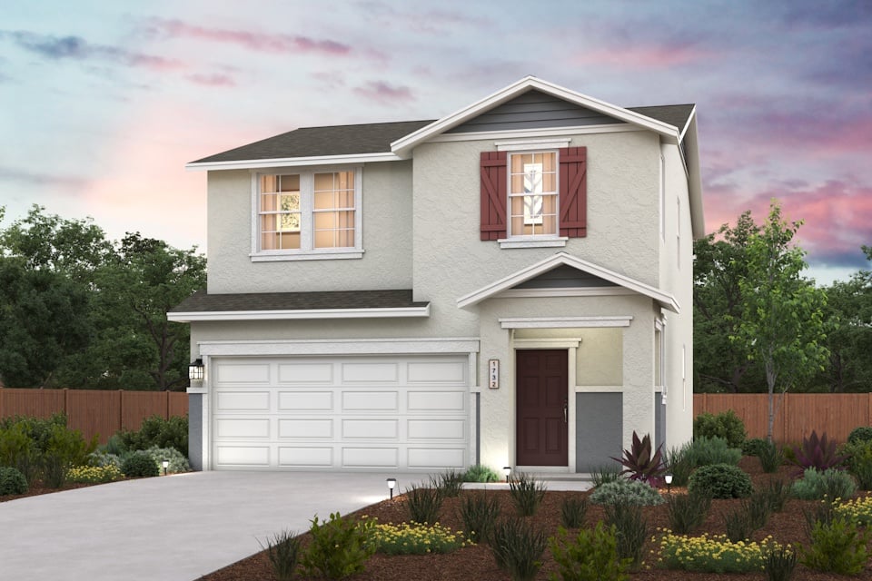 A house with a garage and a fence.