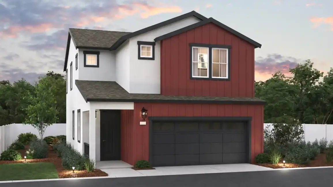 A red house with a garage.