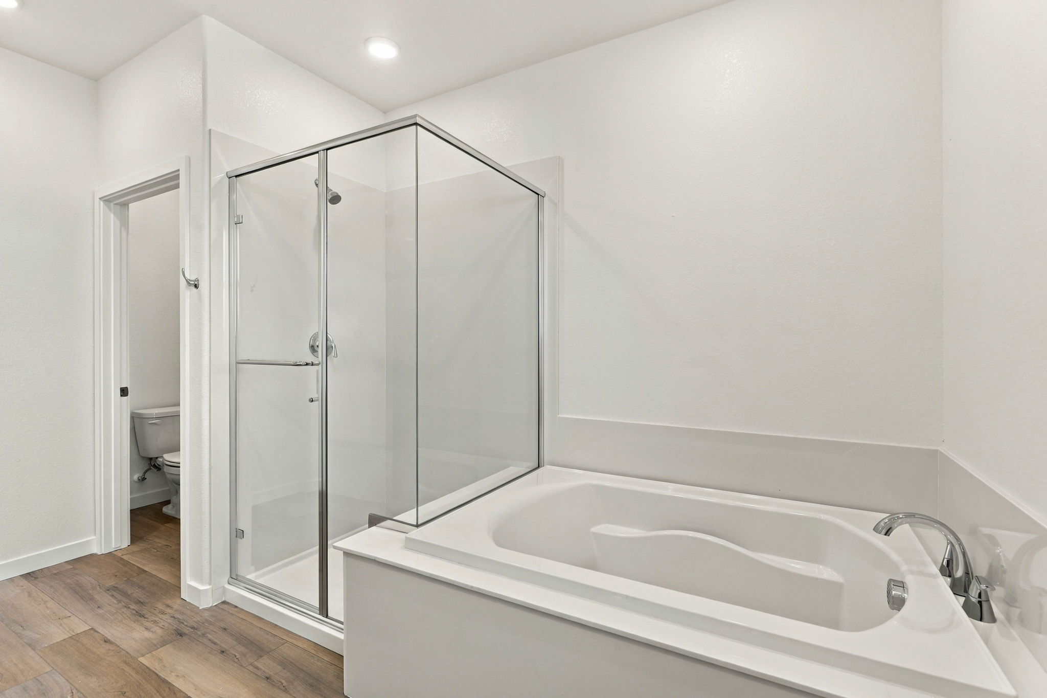 A bathroom with a glass shower.