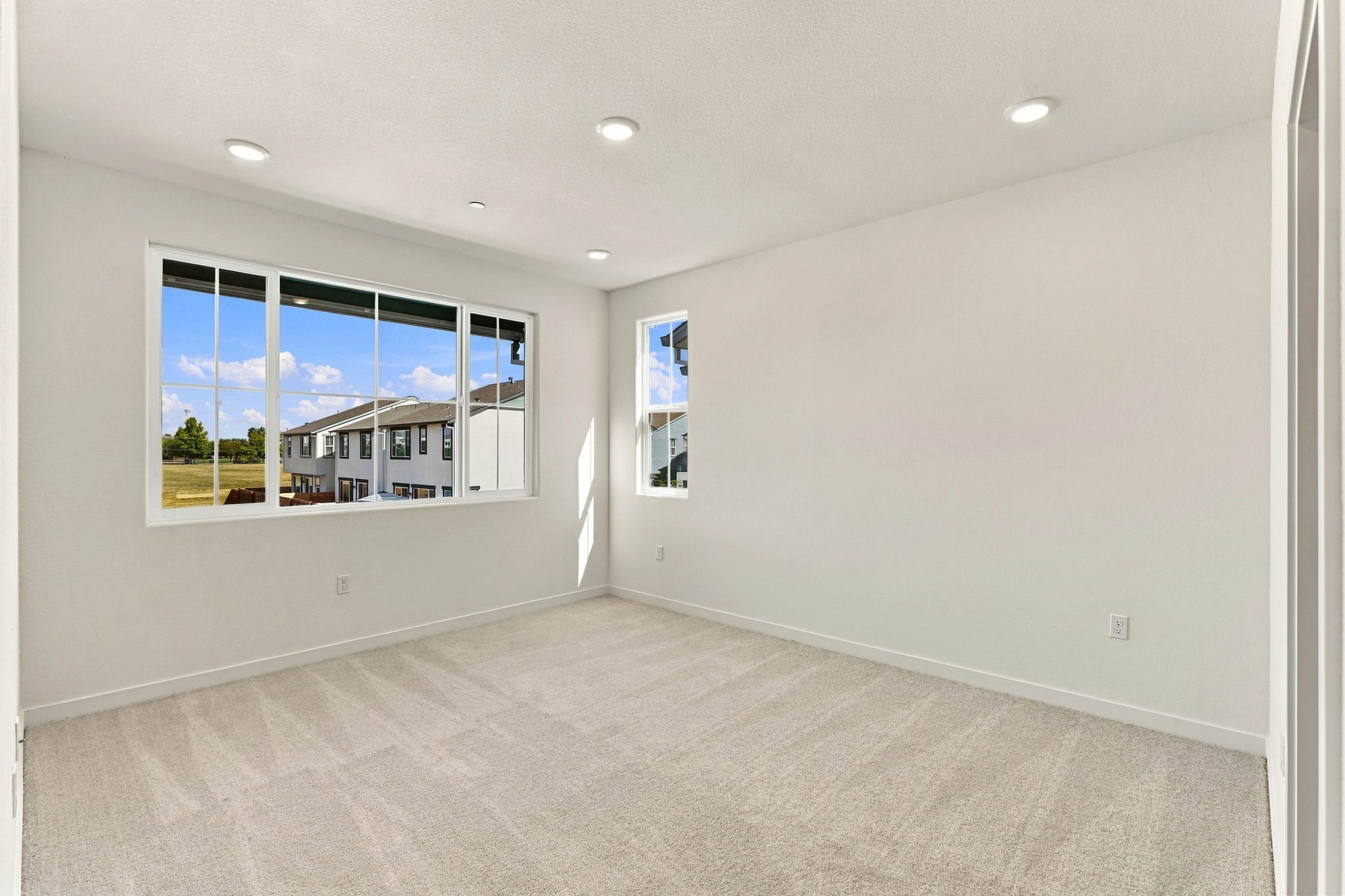 A room with a large window.