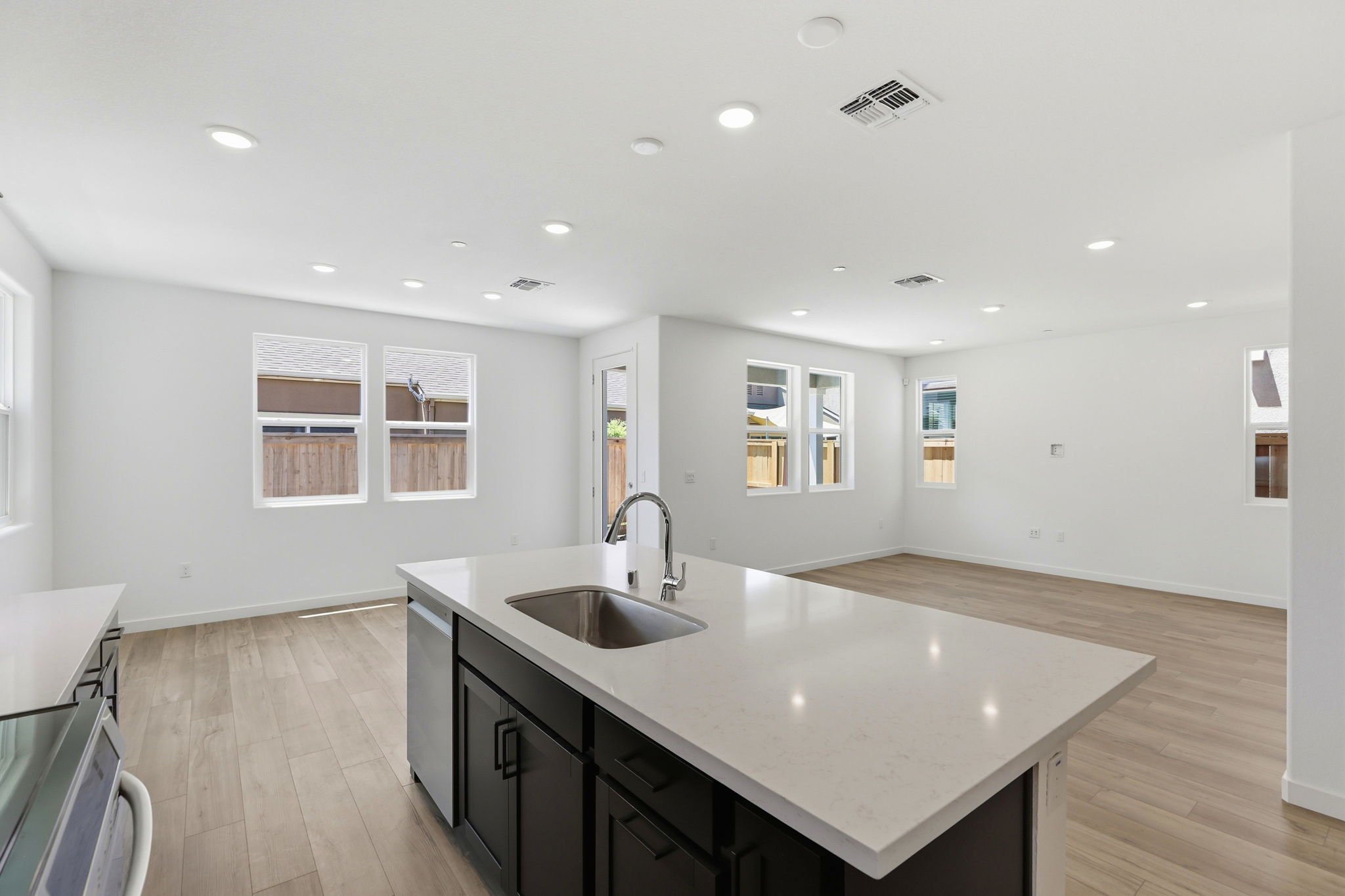 A kitchen with a marble countertop.