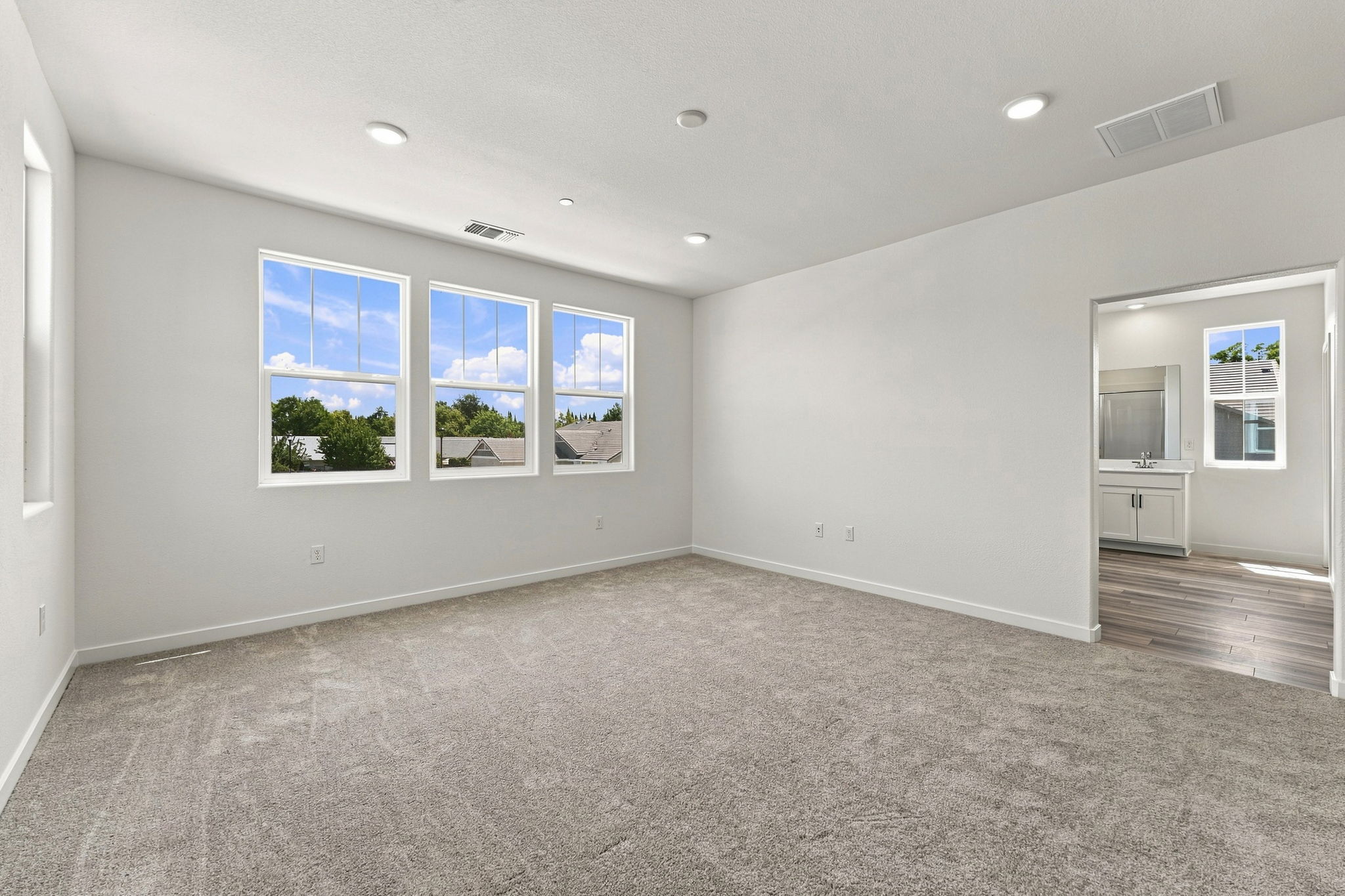 A room with a large window.