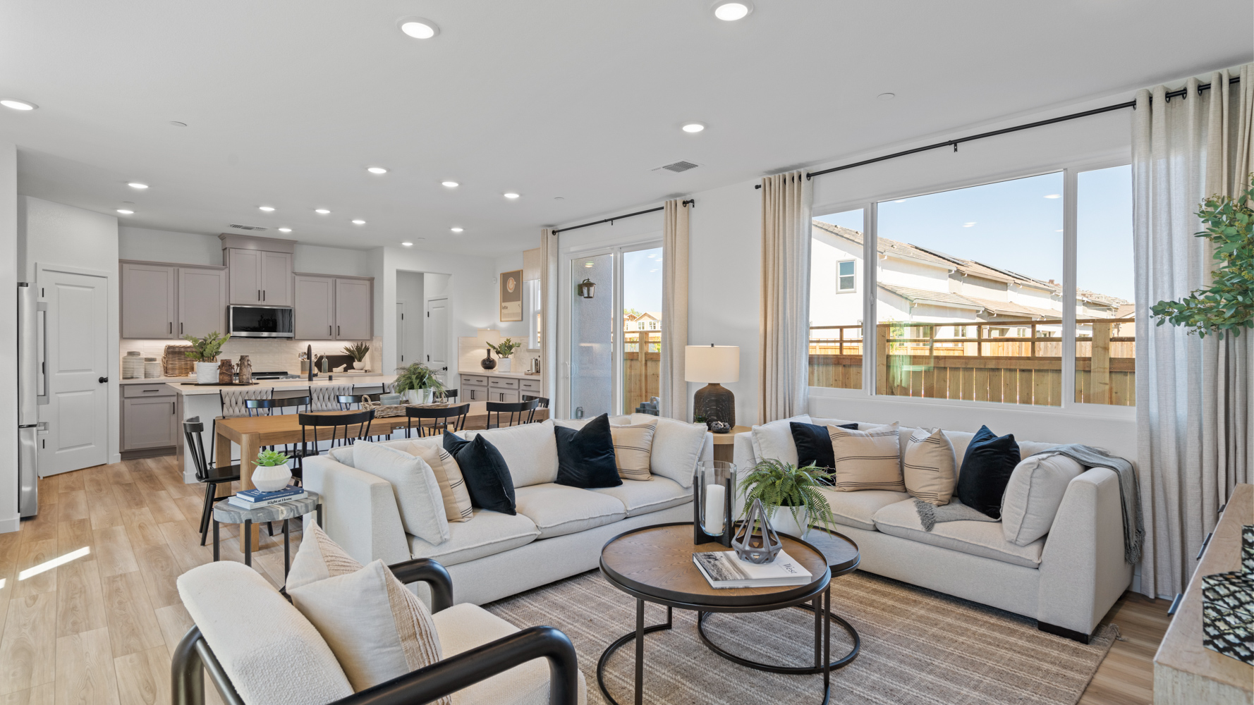 A living room with a large window.