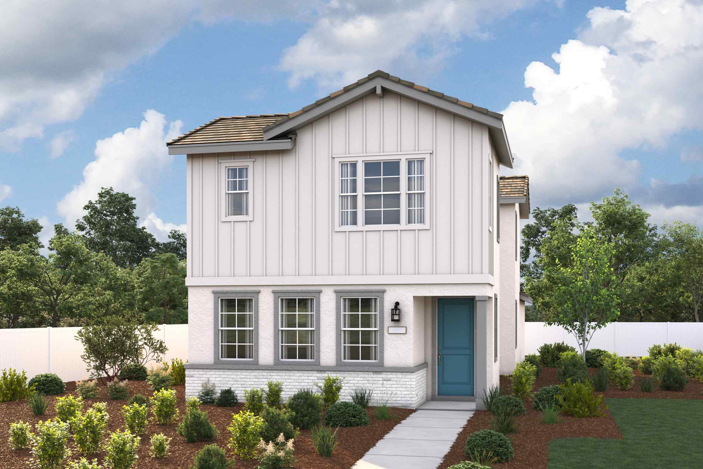 A white house with a blue door.