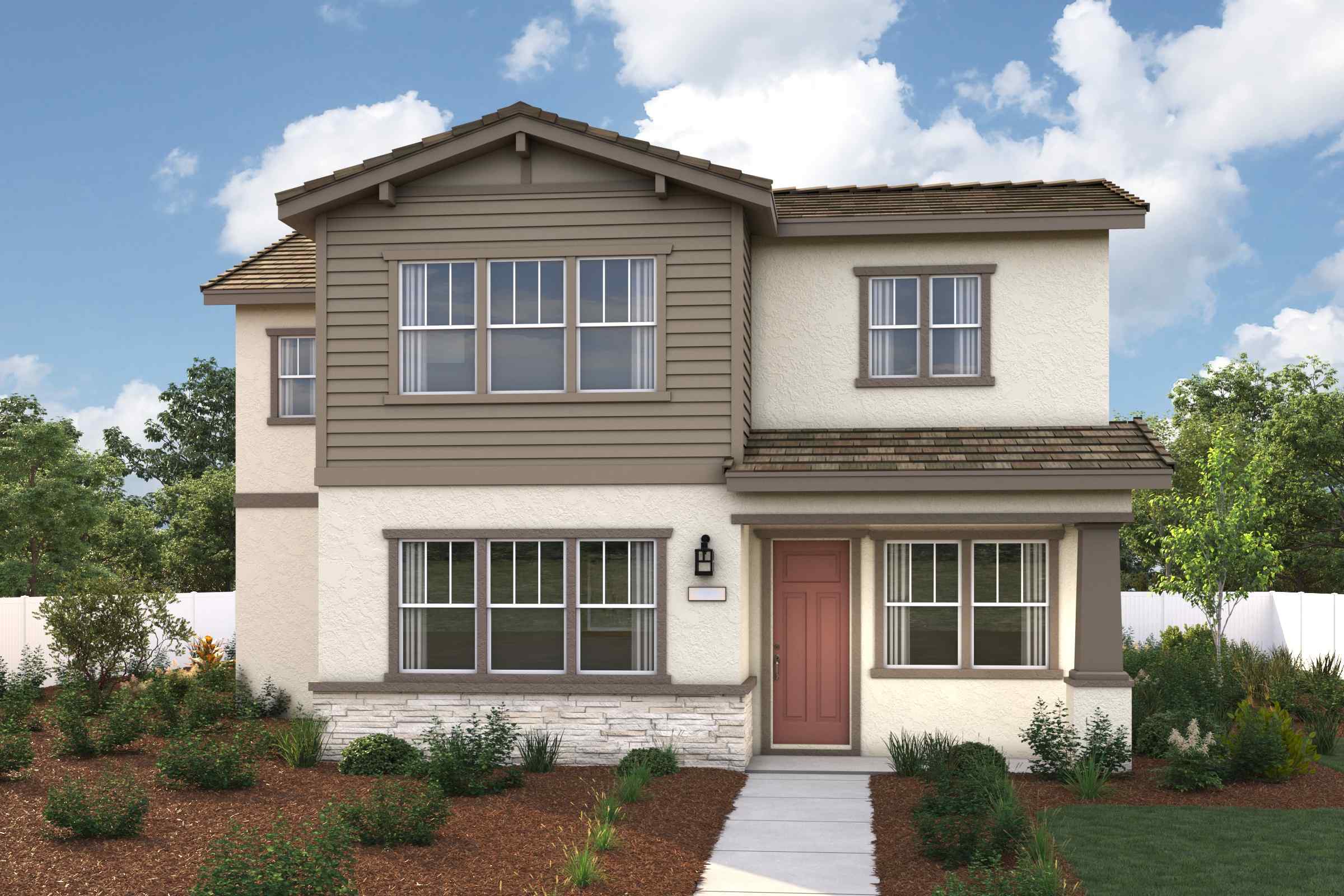 A house with a brick driveway with Emily Carr House in the background.