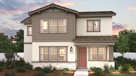 A house with a large front yard.