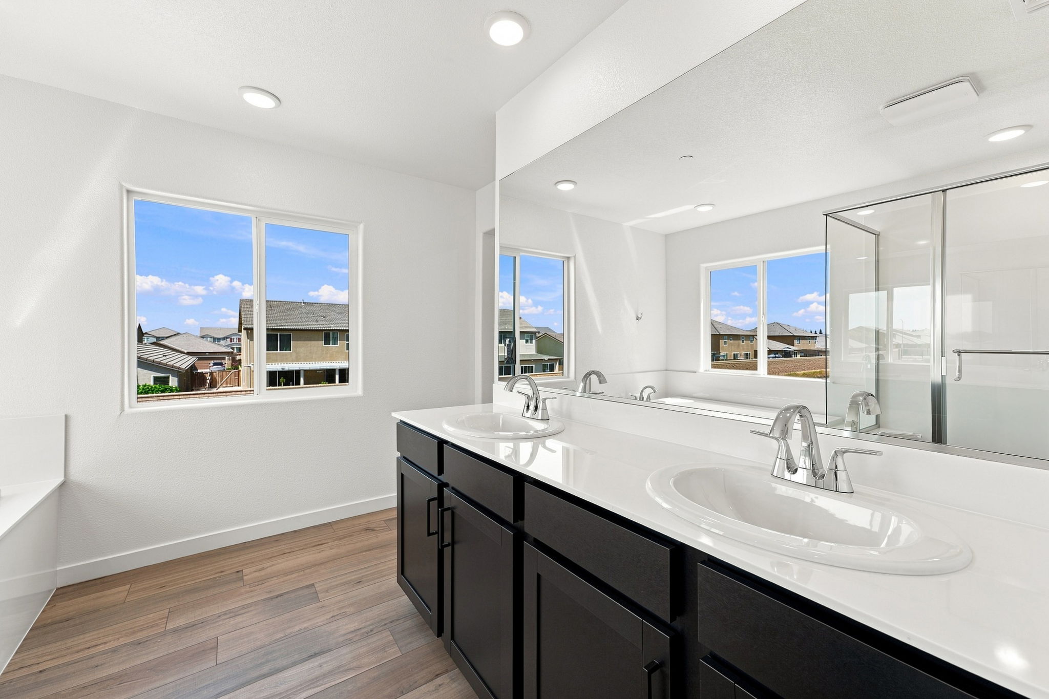 A bathroom with a large window.