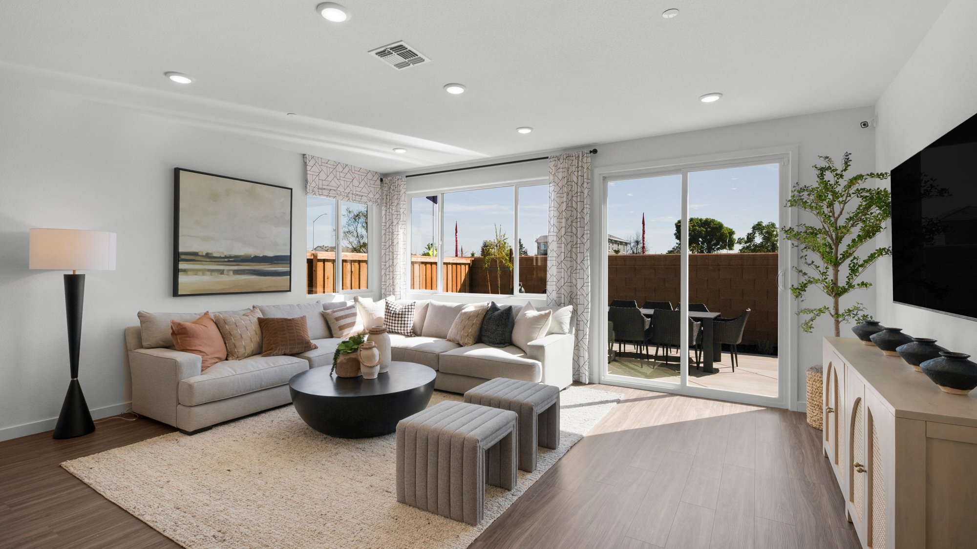 A living room with a large window.