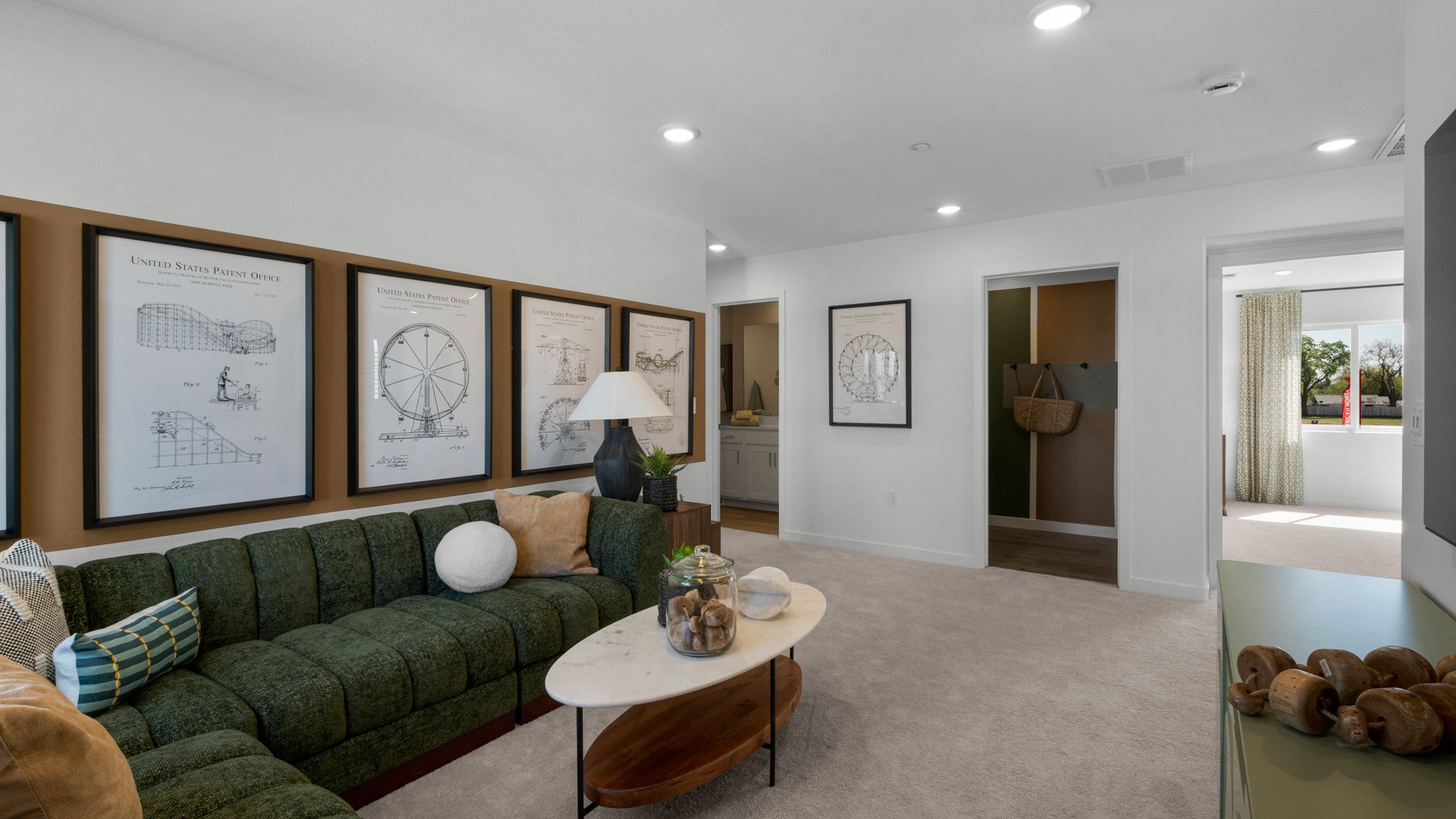 A living room with a green couch.
