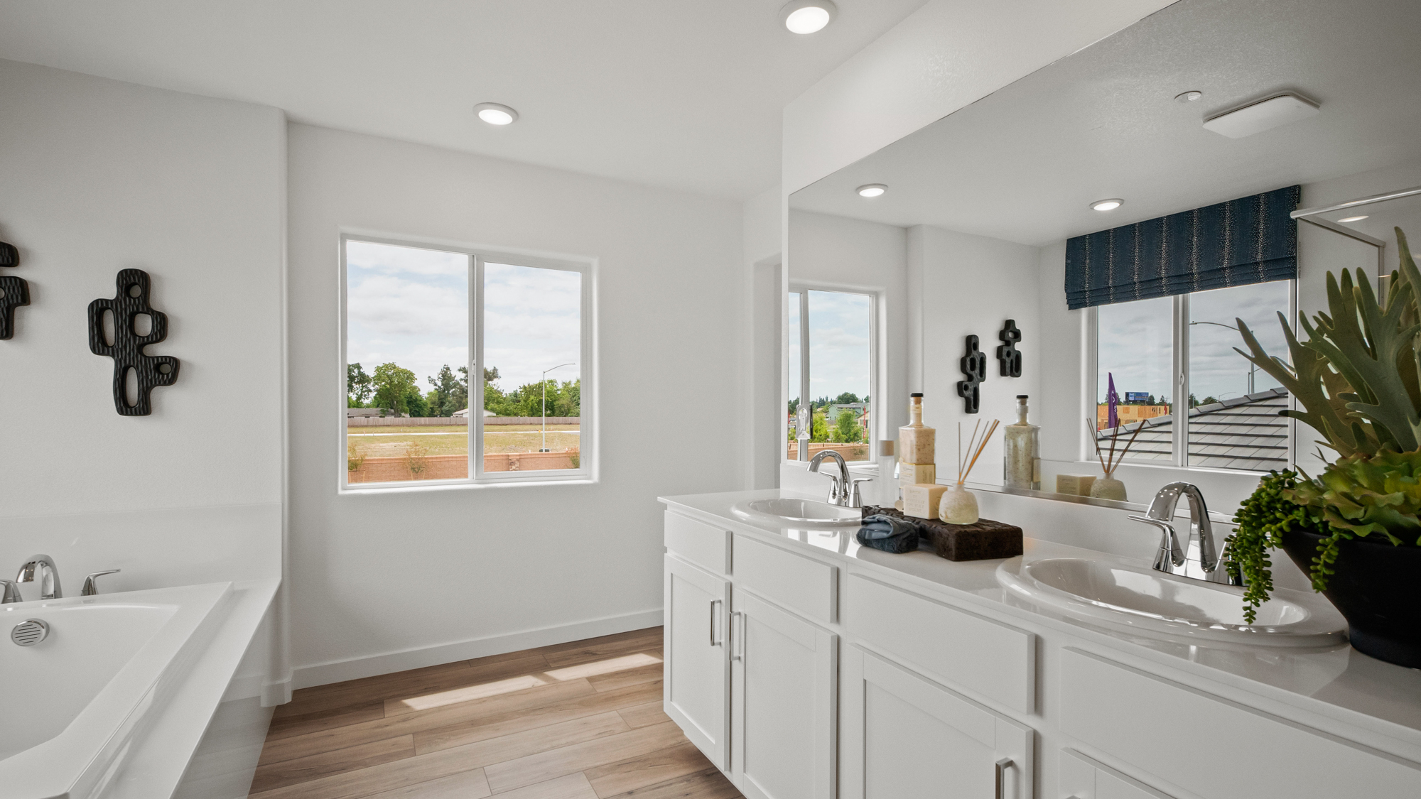 A bathroom with a large window.