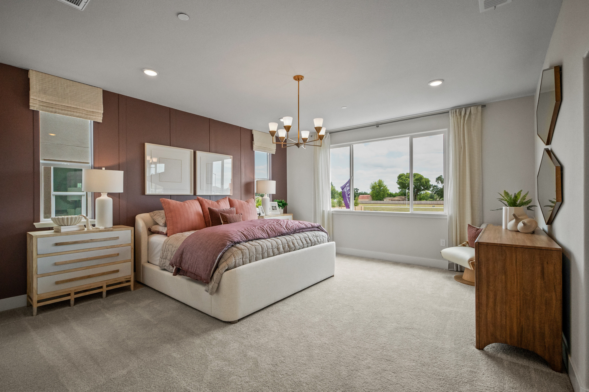 A bedroom with a large bed.