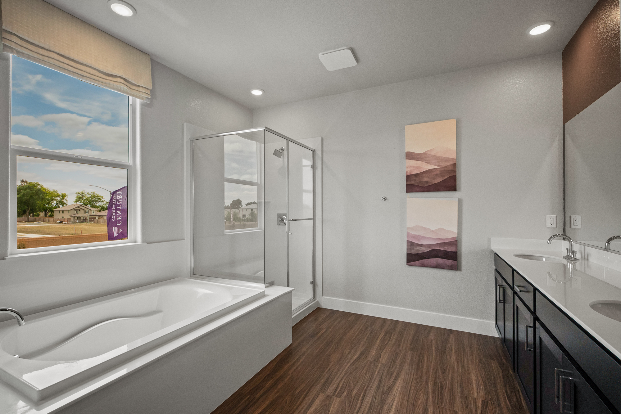 A bathroom with a tub and a sink.