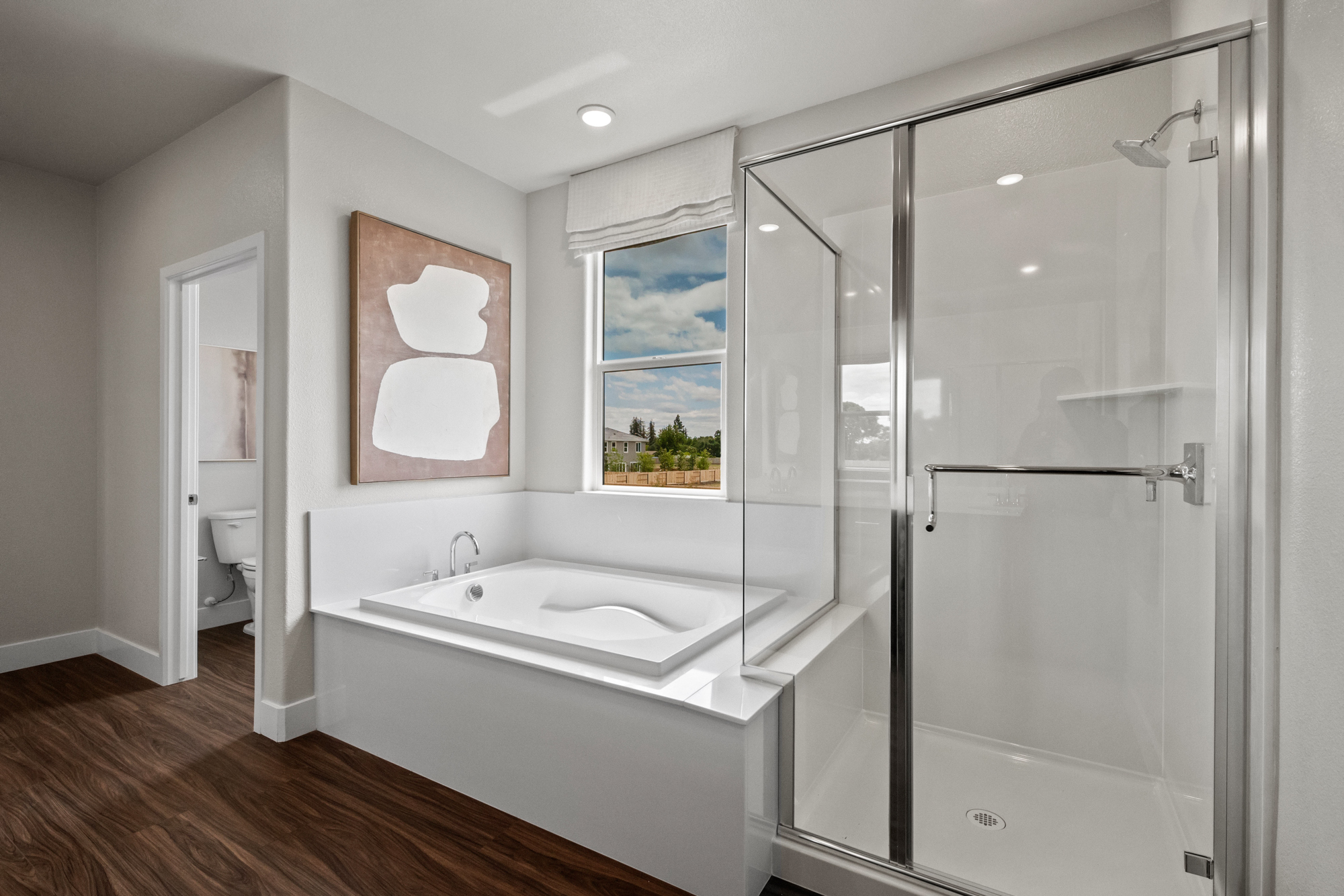 A bathroom with a glass shower.