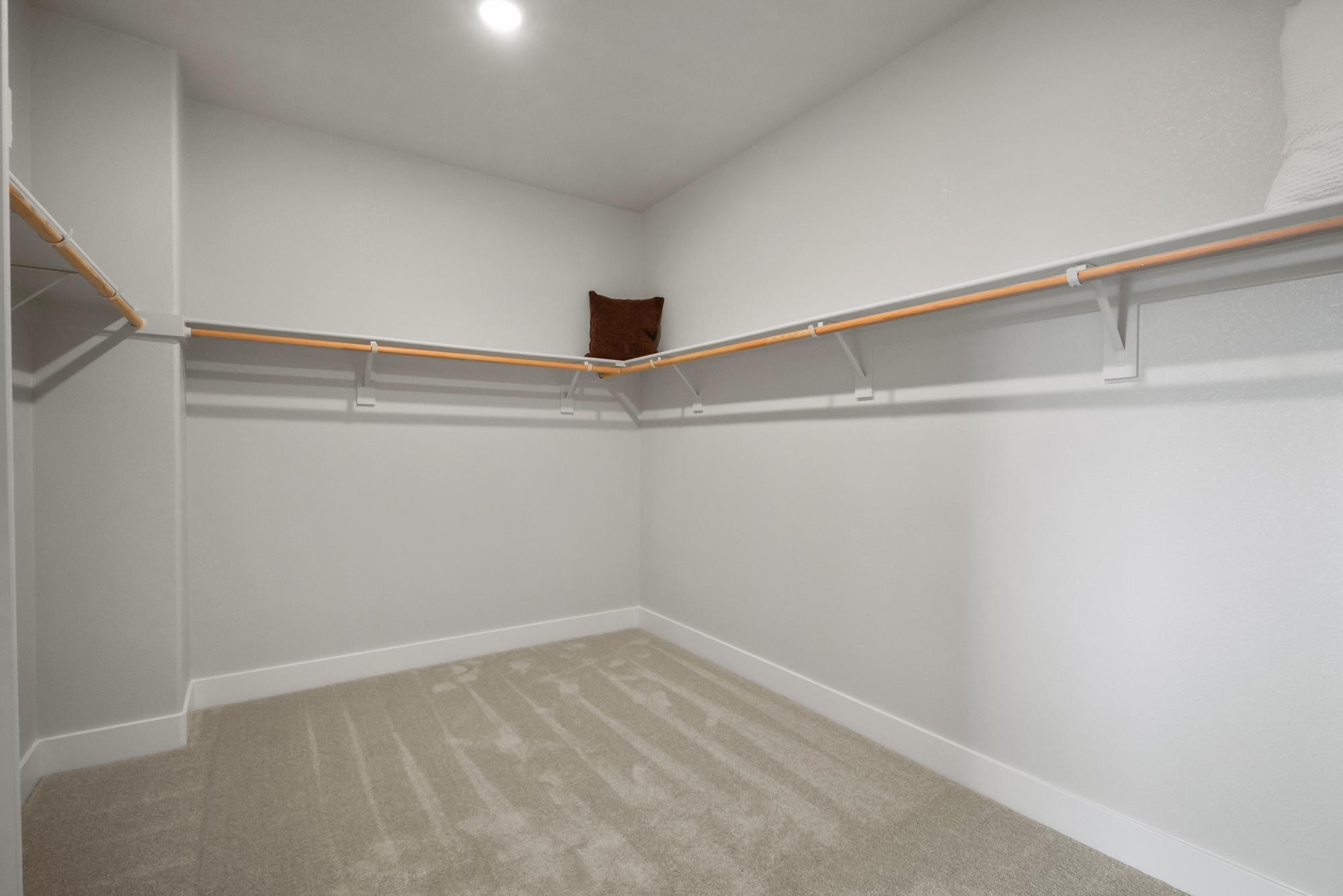 A white room with a staircase.