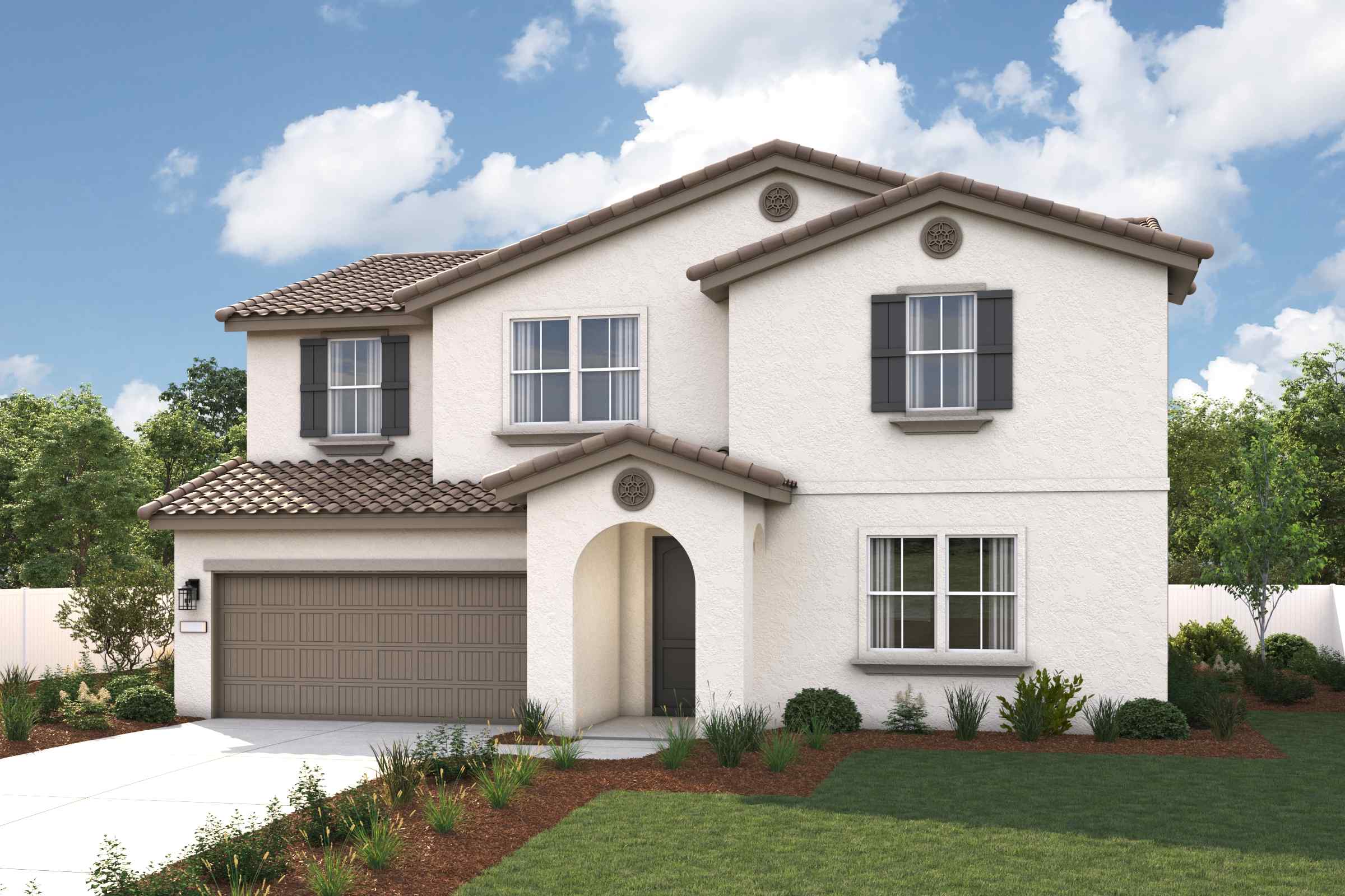 A house with a garage and a lawn in front of it.