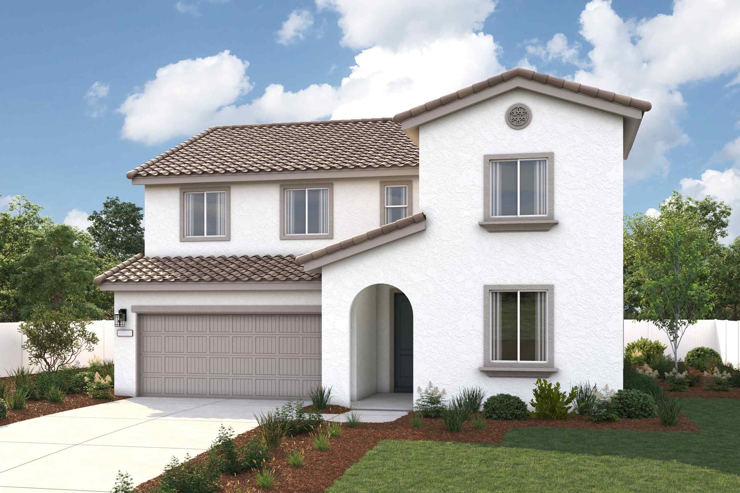 A white house with a garage.