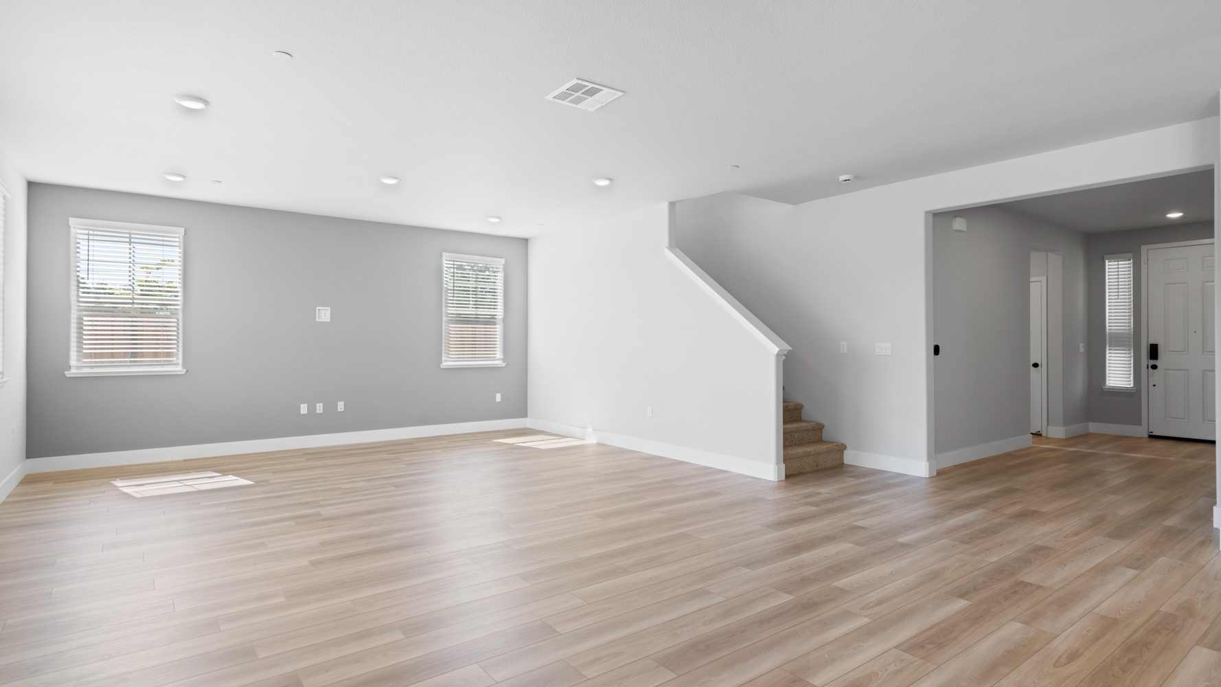 A room with wood floors.