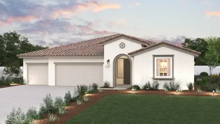 A house with a lawn in front of it.