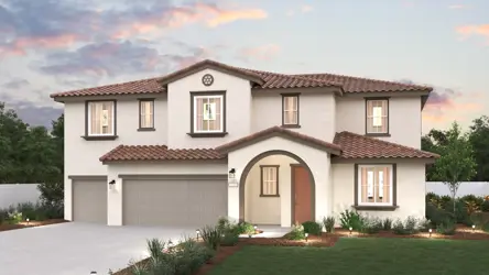 A house with a large front yard.