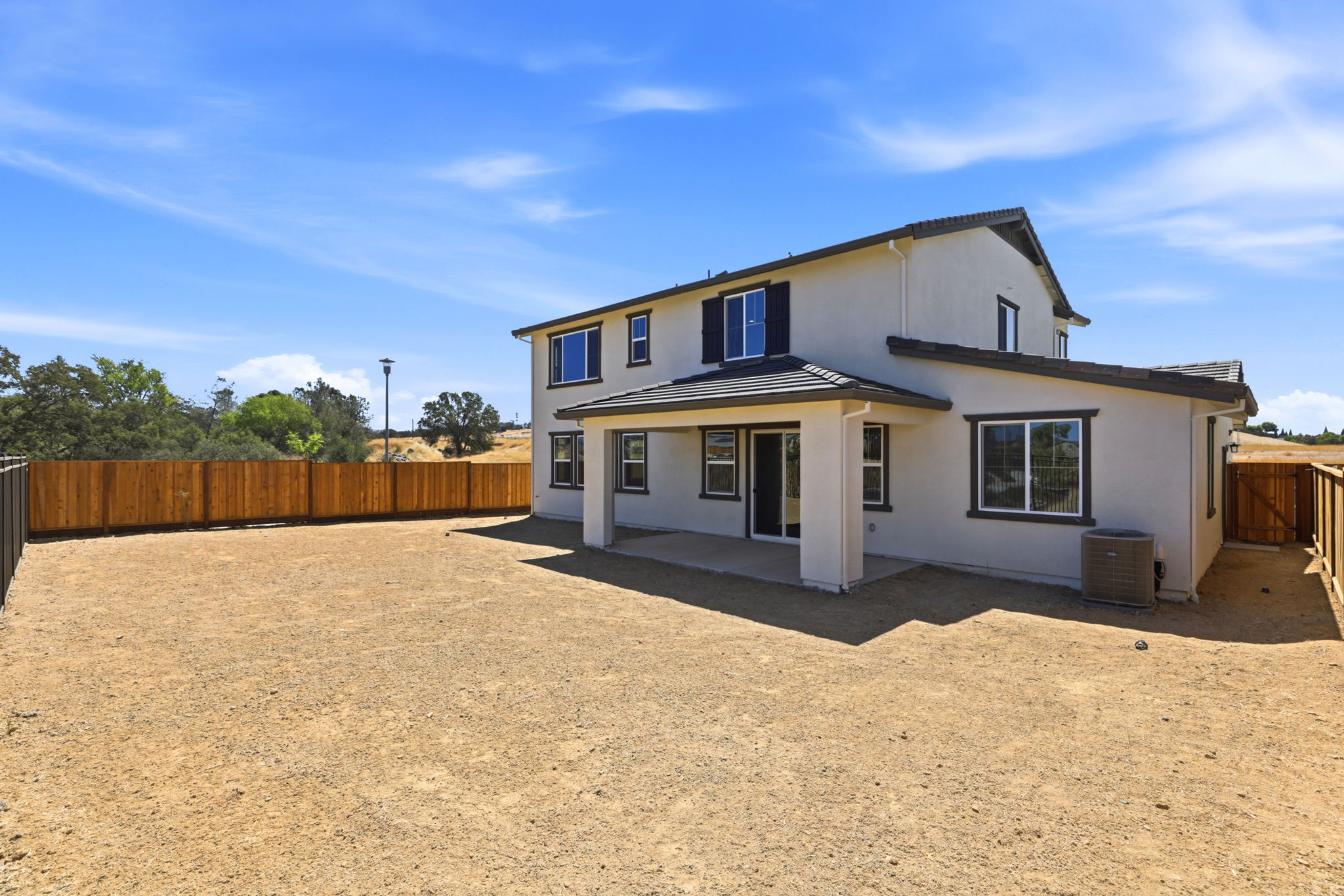 A house with a fence around it.