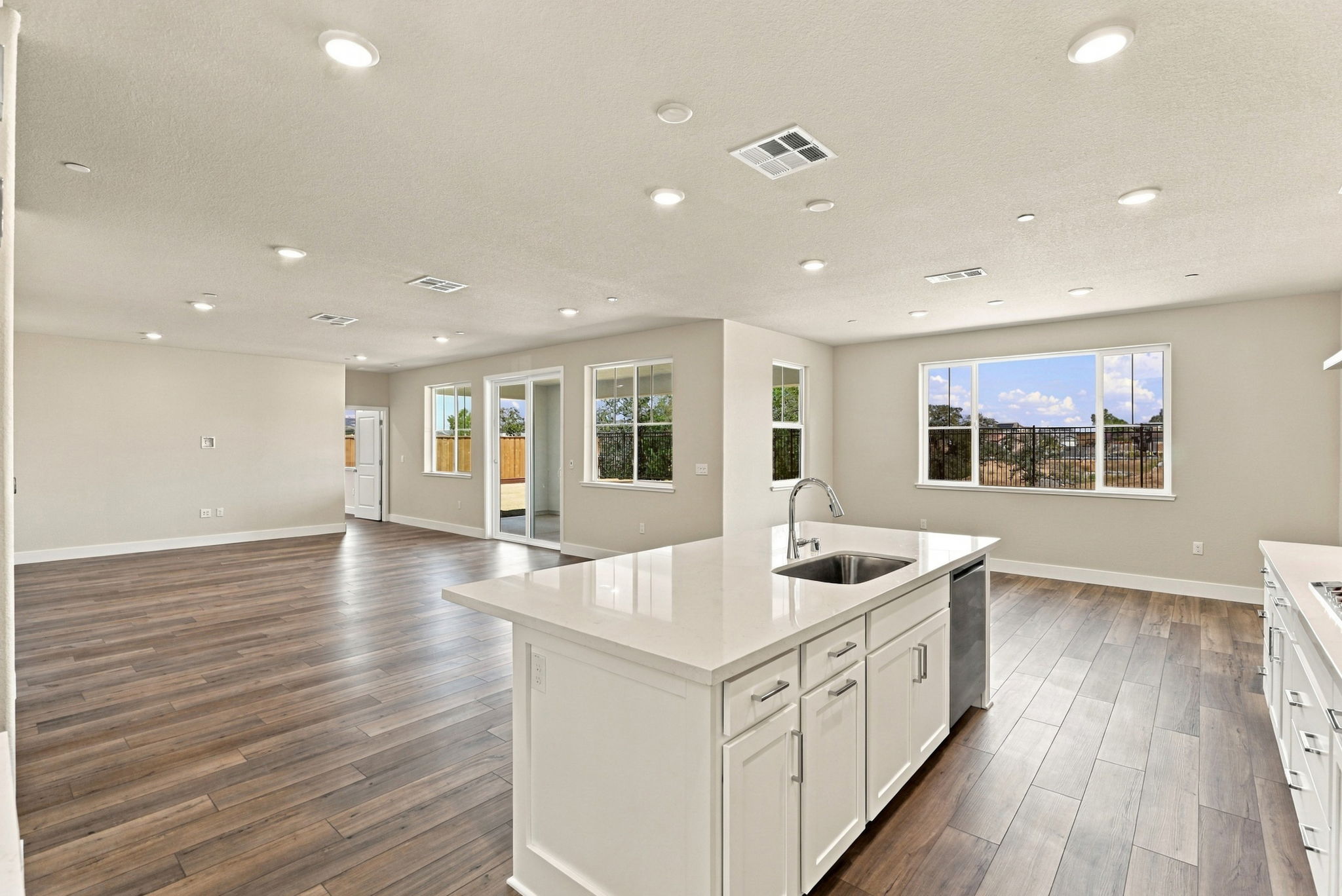 A large kitchen with a large island.