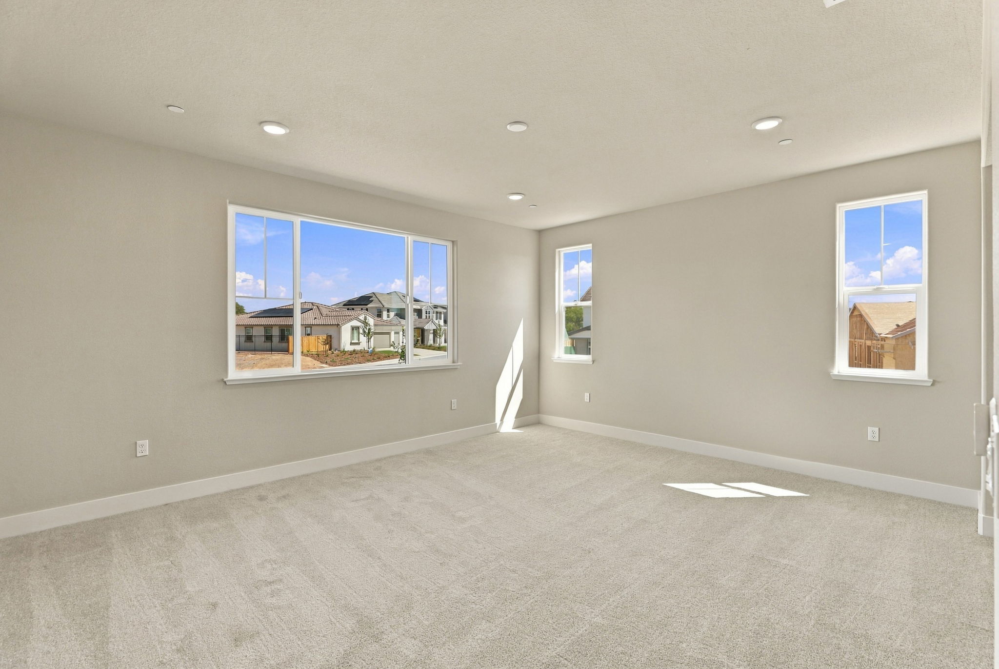 A room with a few windows.