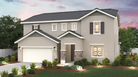 A house with a large front yard.